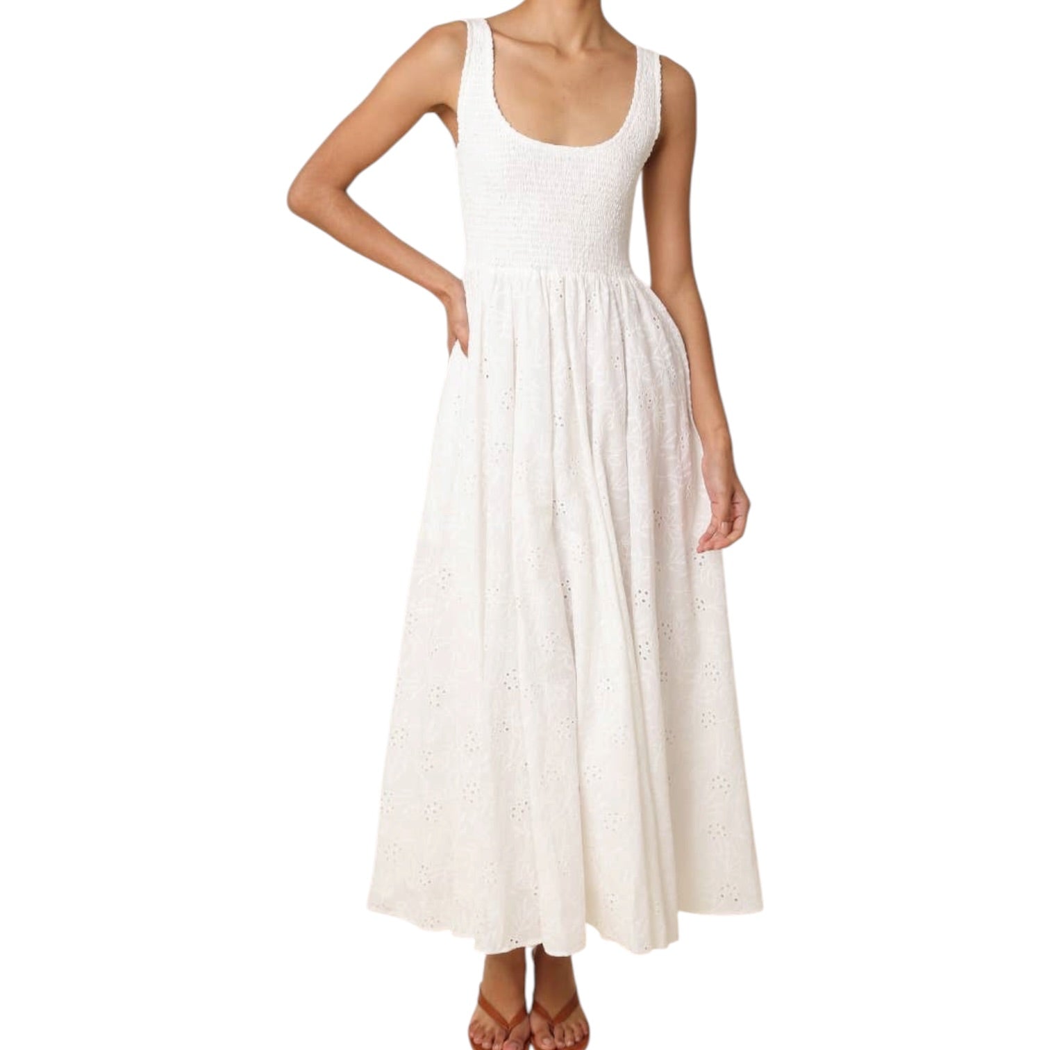 White sleeveless dress worn by a person on a white background