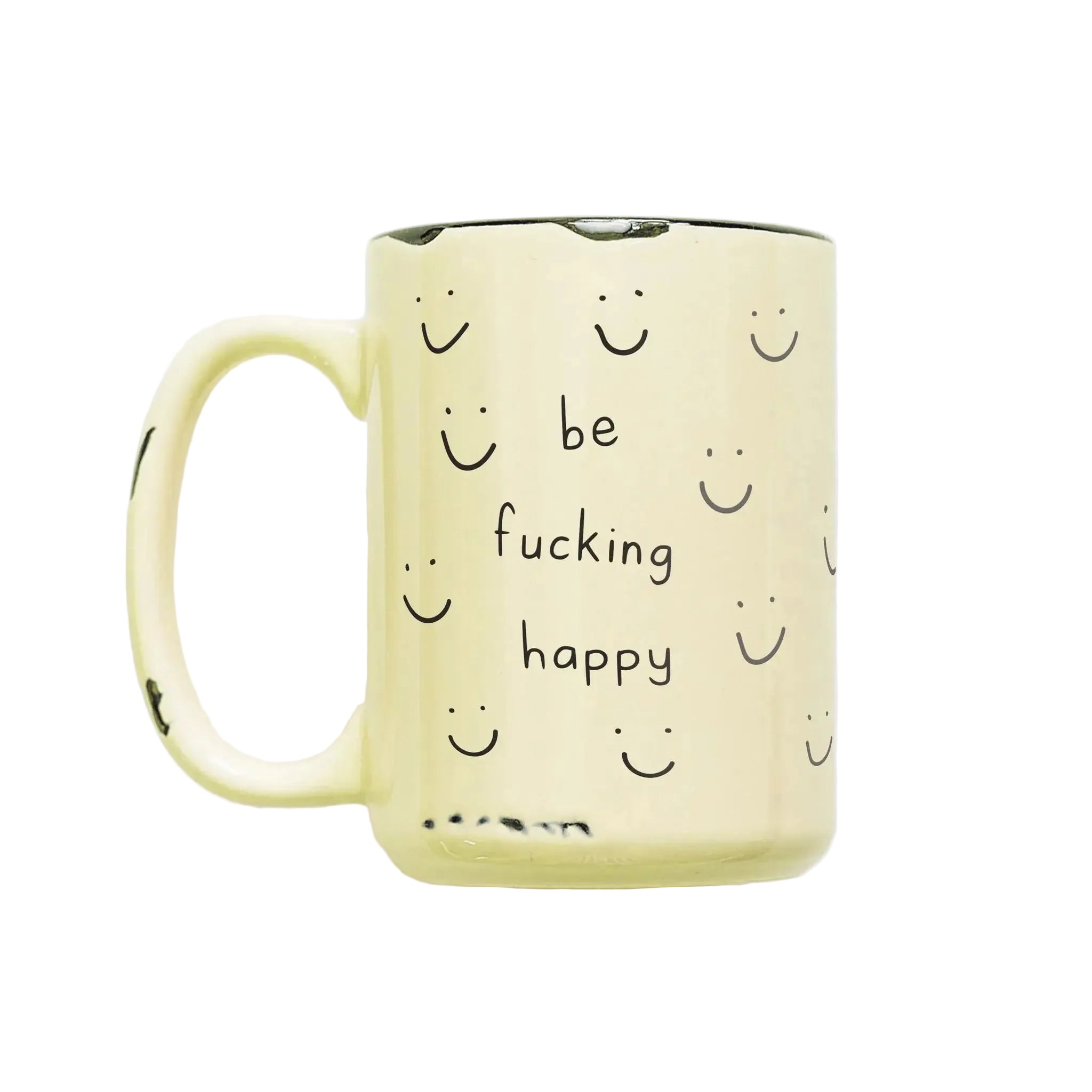 Yellow mug with smiley faces and text 'be fucking happy' on a white background