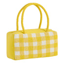 Yellow handbag with a checkered pattern on a white background