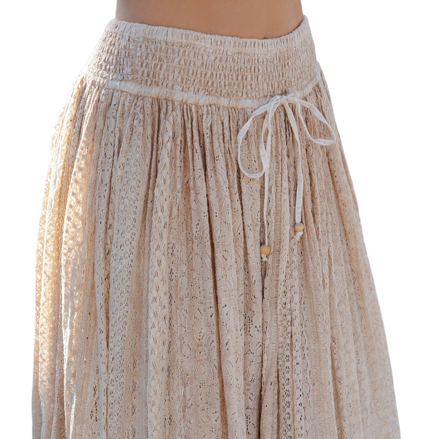Beige lace skirt with a drawstring waist on a white background