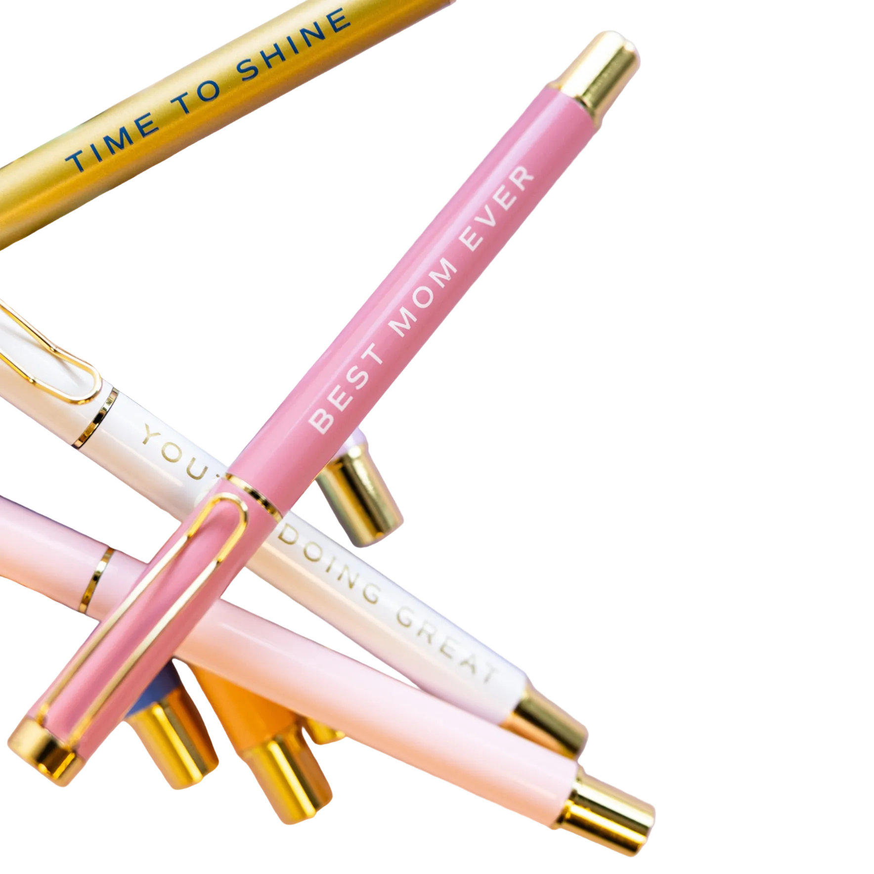 Set of pens with motivational phrases on a soft pink background