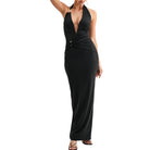 Black halter neck gown on a white background