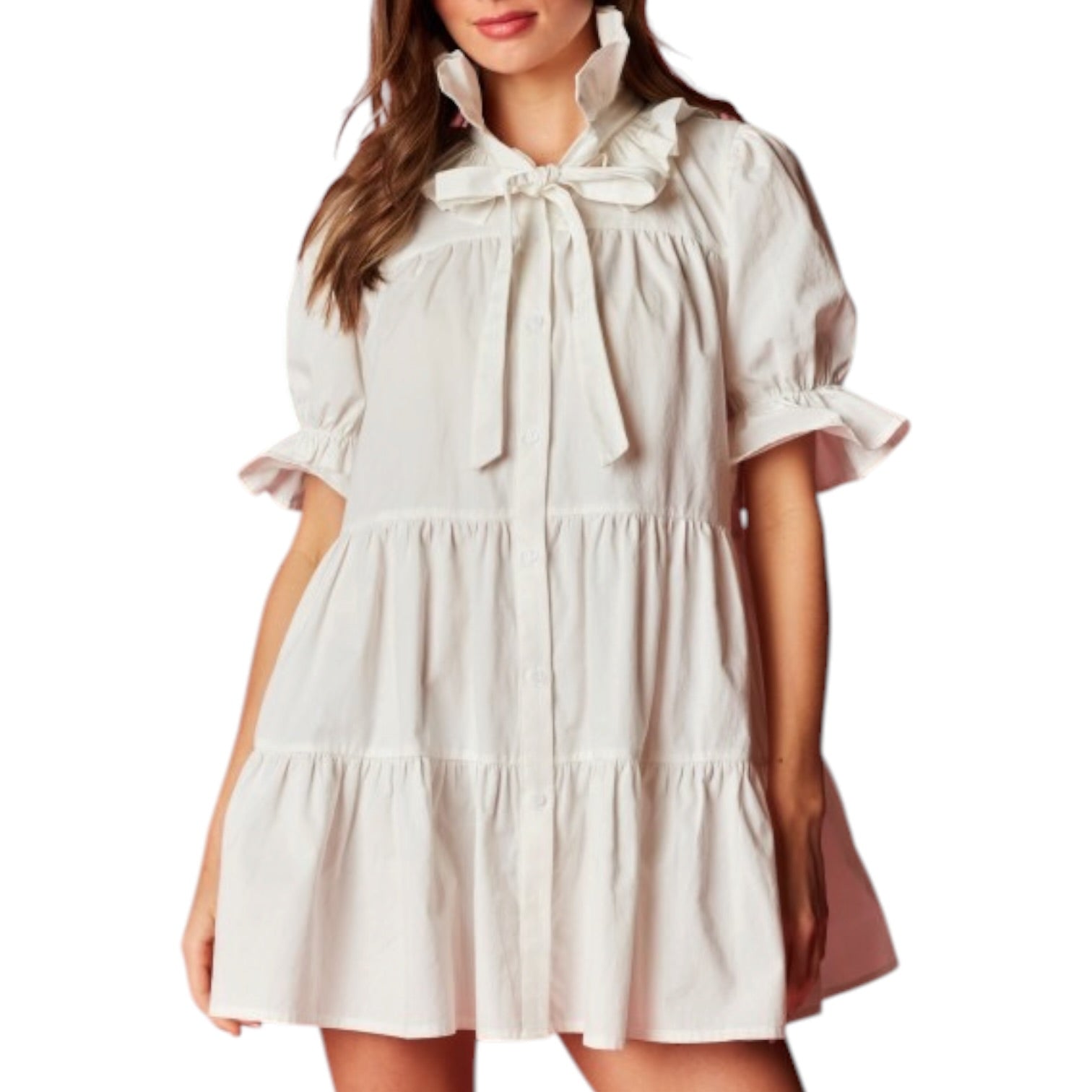 White dress with ruffled sleeves and a bow neckline on a white background