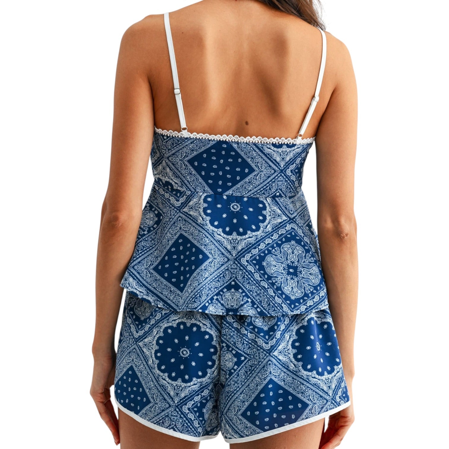 Blue patterned set worn by a person on a white background