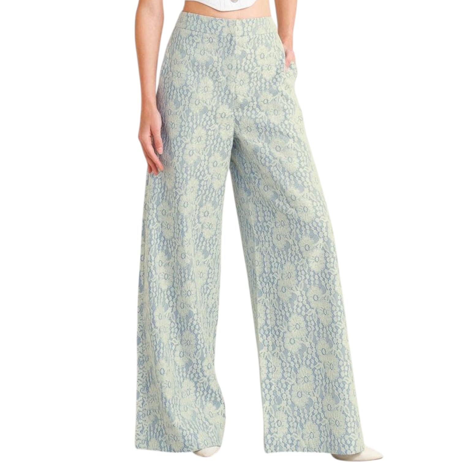 woman wearing floral lace pants with white background