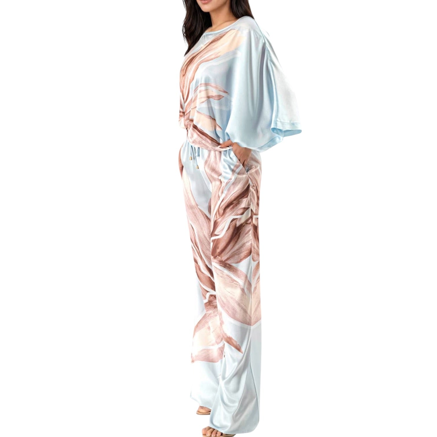 Woman wearing a floral set on a white background