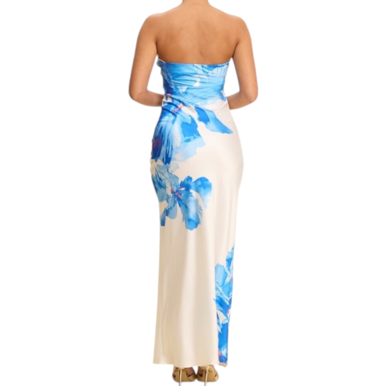 Woman wearing a strapless dress with blue floral pattern on a white background