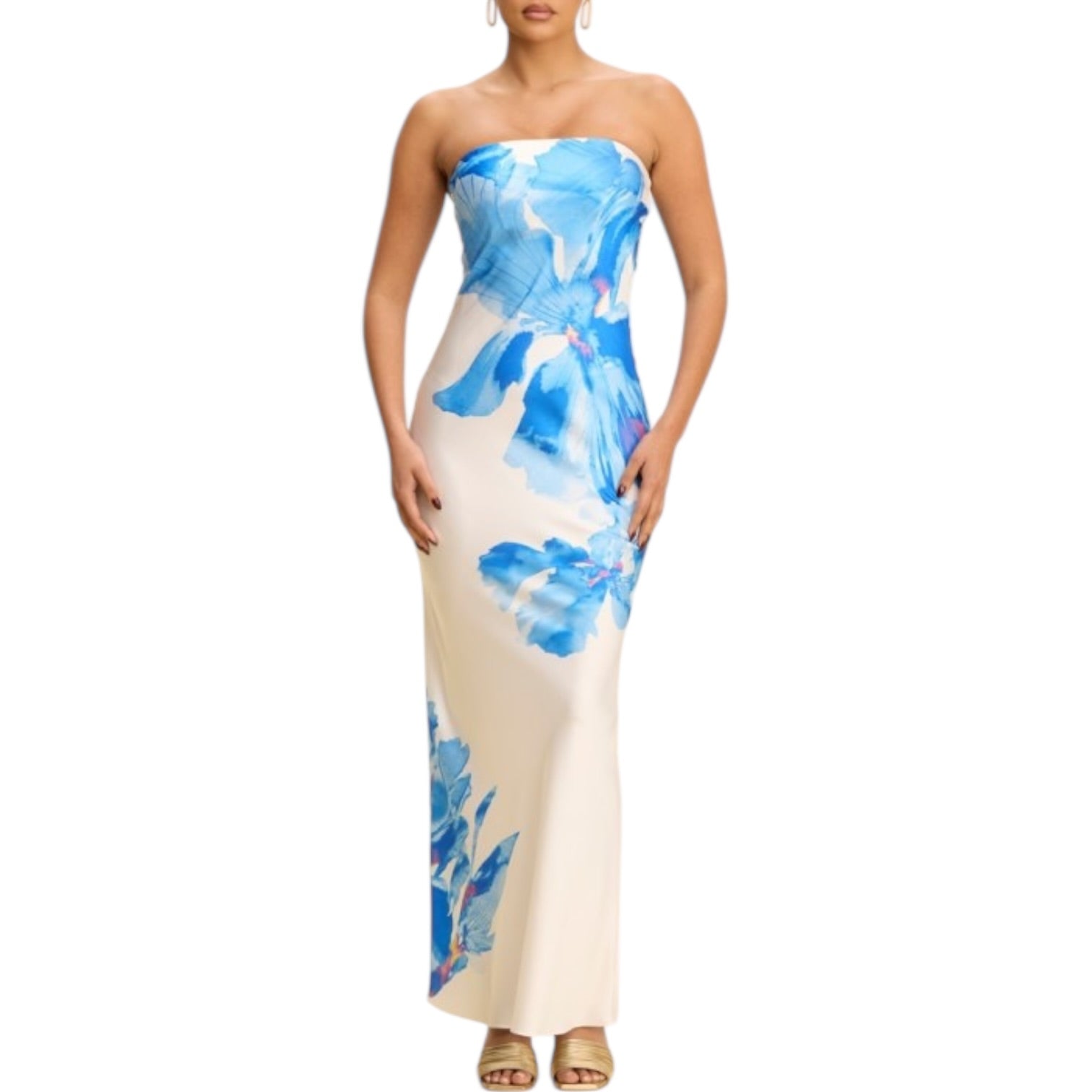 Woman wearing a strapless dress with blue floral pattern on a white background