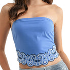 Blue strapless top with lace detail on a white background