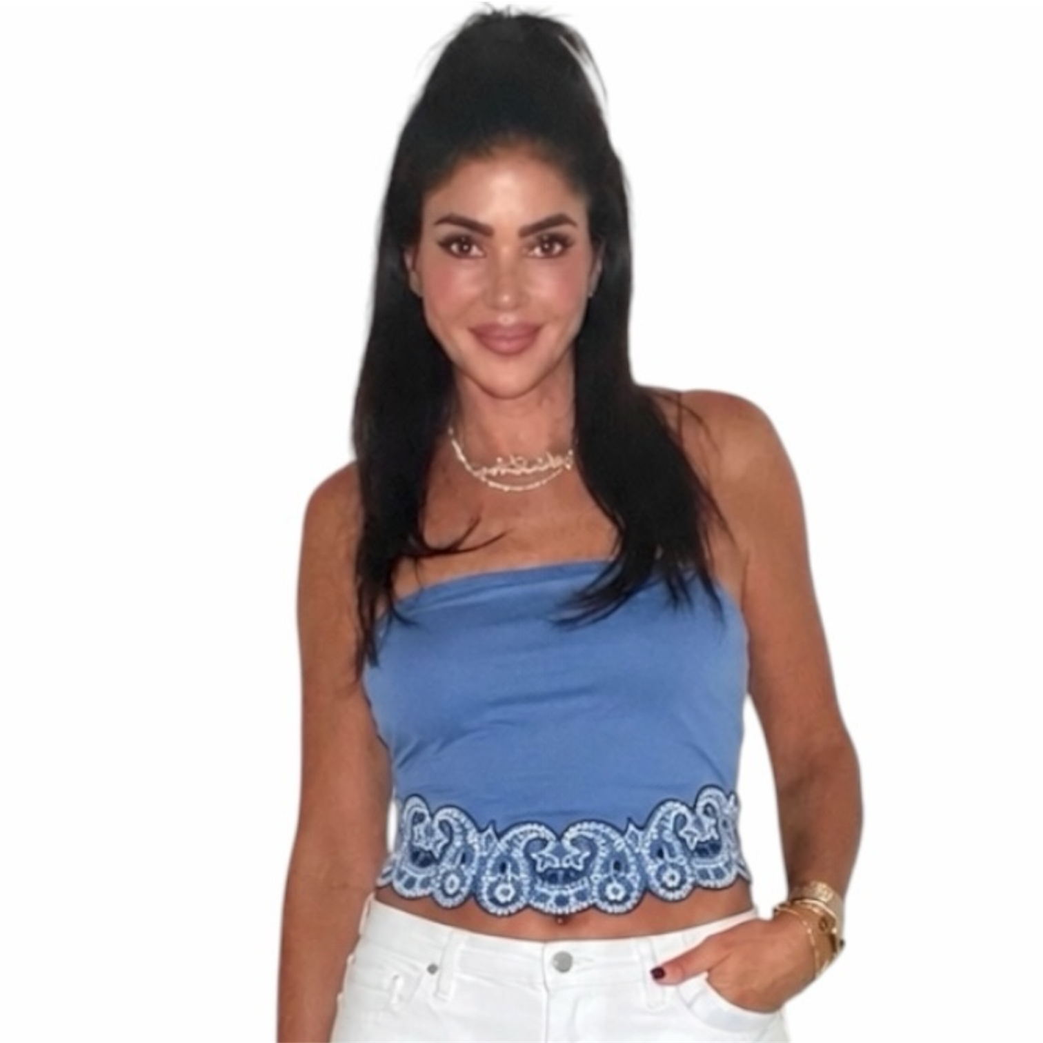 Woman wearing a blue top with lace detail on a white background