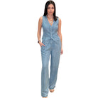 Woman wearing a light blue denim outfit on a white background