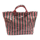 Striped tote bag with pink and black vertical stripes on a white background