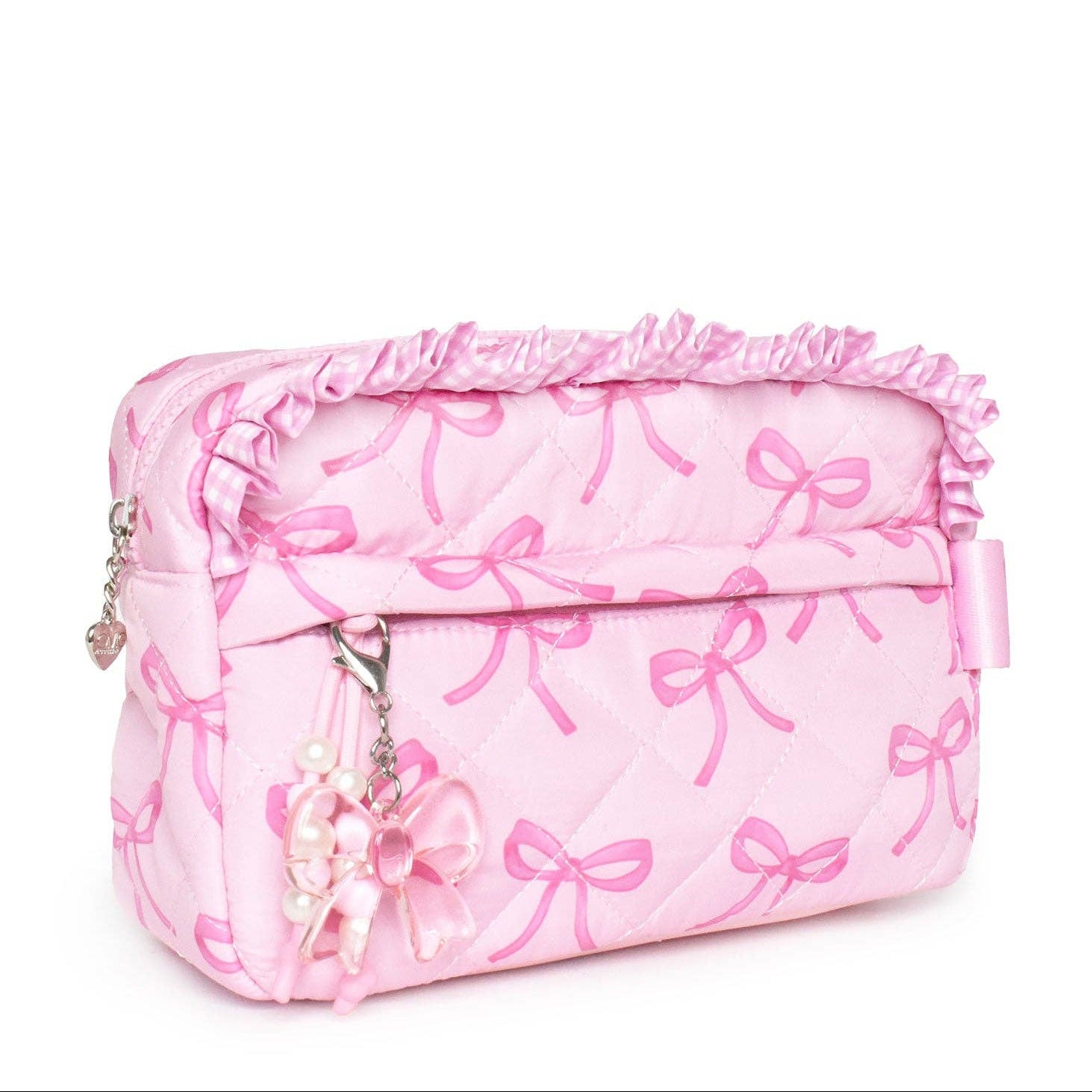 Pink cosmetic bag with bow pattern on a white background