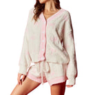 Fluffy pink and white set on a white background