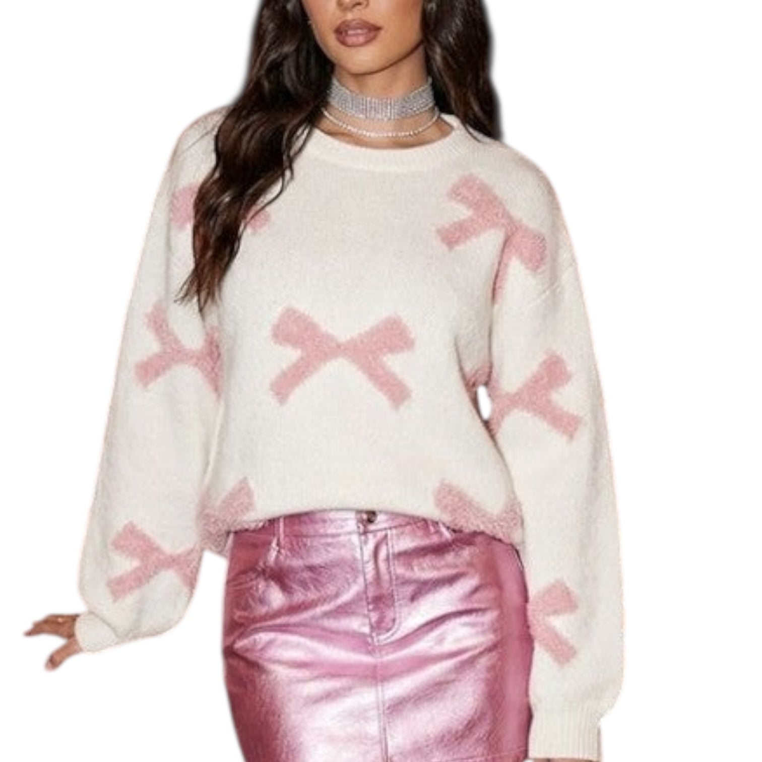 White sweater with pink bows worn by a model on a white background