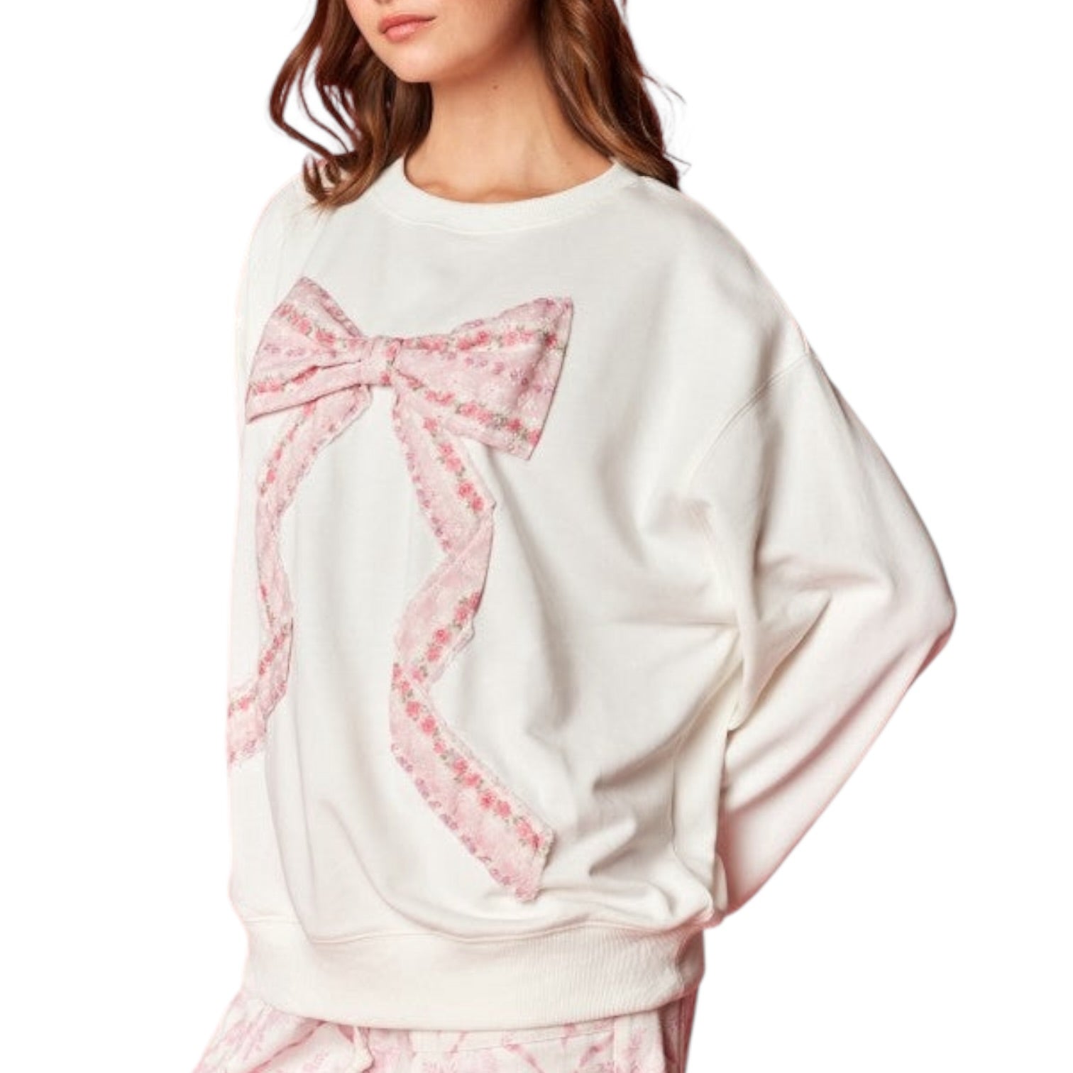 White sweatshirt with a pink bow design on a white background