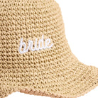Beige straw hat with 'bride' embroidery on a white background