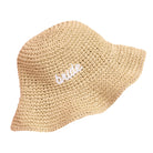 Beige straw bucket hat with 'bride' embroidery on a white background