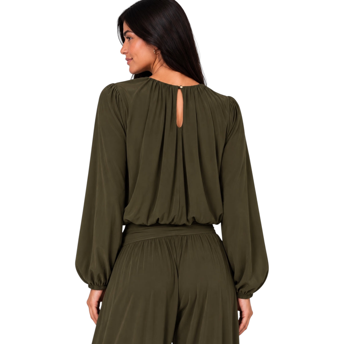 A woman shown from the back wearing an olive green long-sleeve jumpsuit with a keyhole back cutout, photographed against a plain white background.