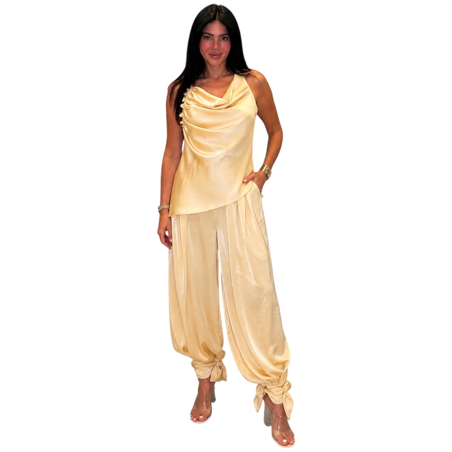 Woman wearing a yellow outfit on a white background