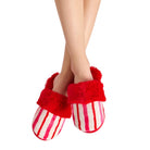 Red and white striped fuzzy slipper slippers worn on a person's feet, shown against a plain white background.
