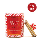 Candy cane-themed candle with peppermint swirl design on a white background