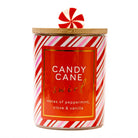 Candle with candy cane design and peppermint on top