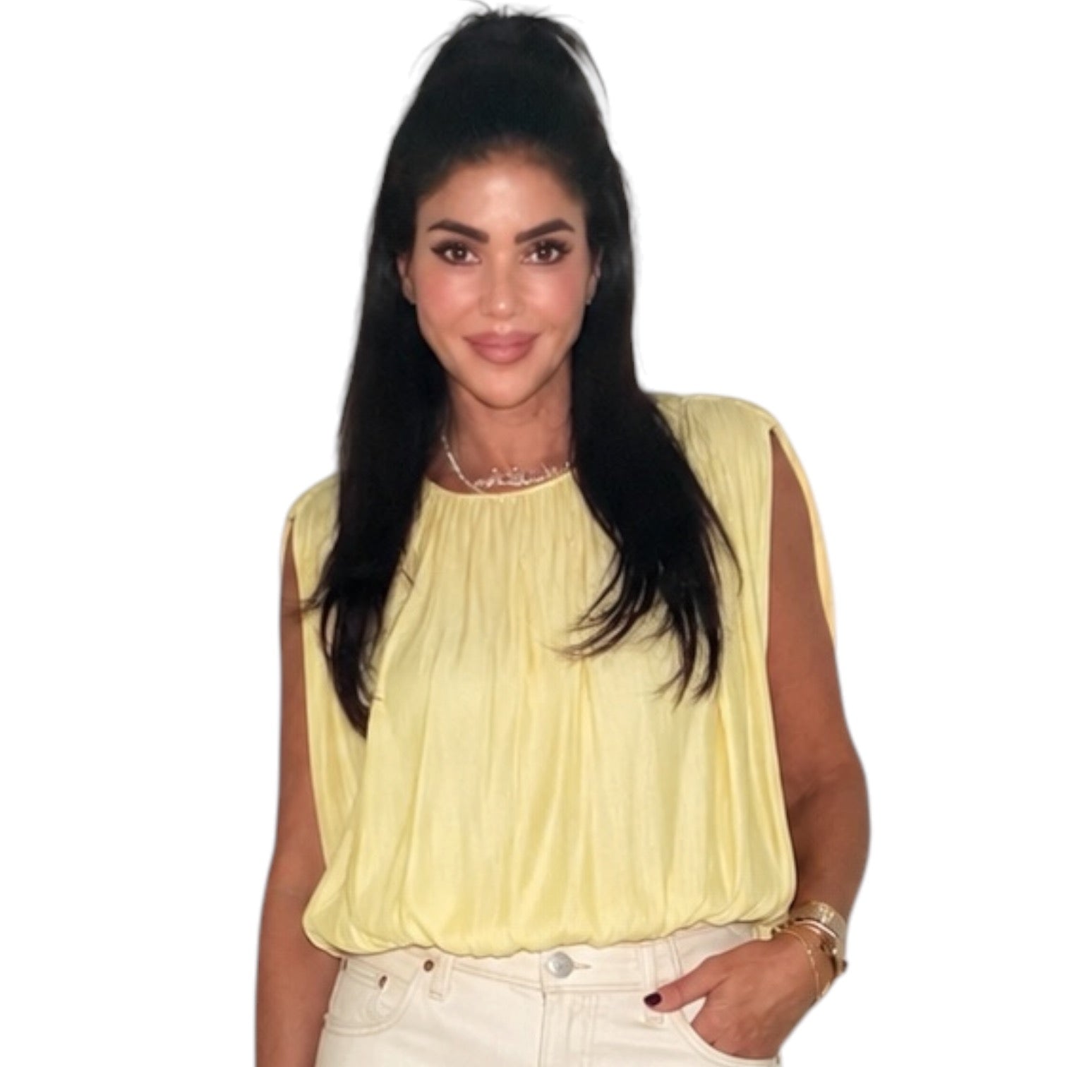 Woman wearing a yellow sleeveless top on a white background