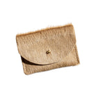 A small brown hair-on-hide cardholder with a gold snap button closure, shown on a plain white background.