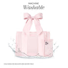 Pink tote bag with a bow on a white background, labeled 'Machine Washable'.