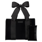 Black tote bag with a large black bow and a matching pouch on a white background