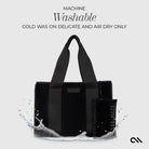 Black tote bag with water splashes on a light gray background, featuring washing instructions.