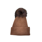 Brown knit beanie with a fluffy pom-pom on a white background