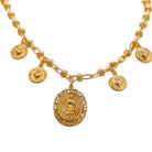 Gold chain necklace featuring a central oval pendant with a religious figure and five smaller hanging medallions, shown on a plain white background.