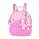 Pink backpack with decorative elements on a white background
