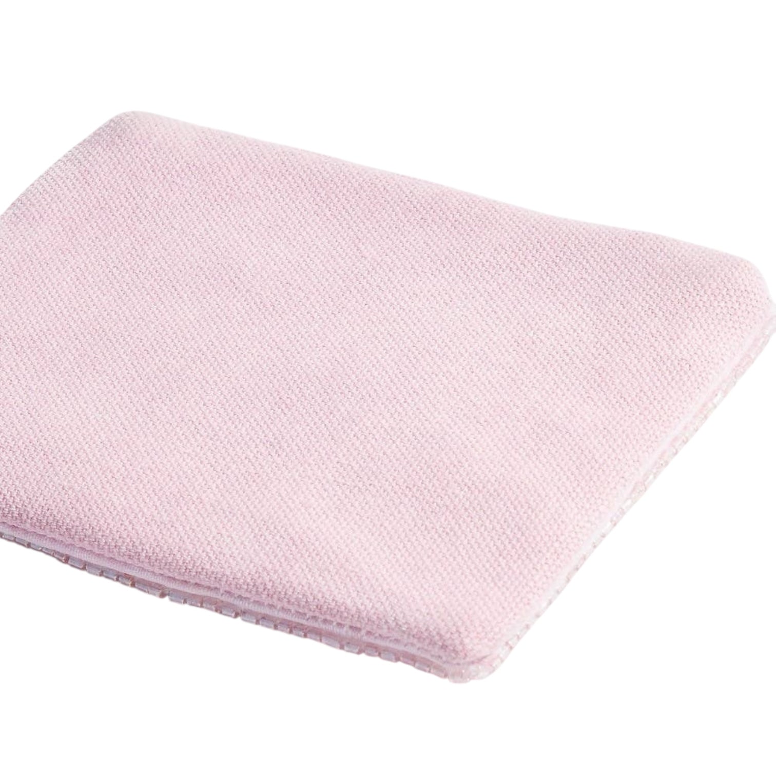 Folded pink blanket on a white background