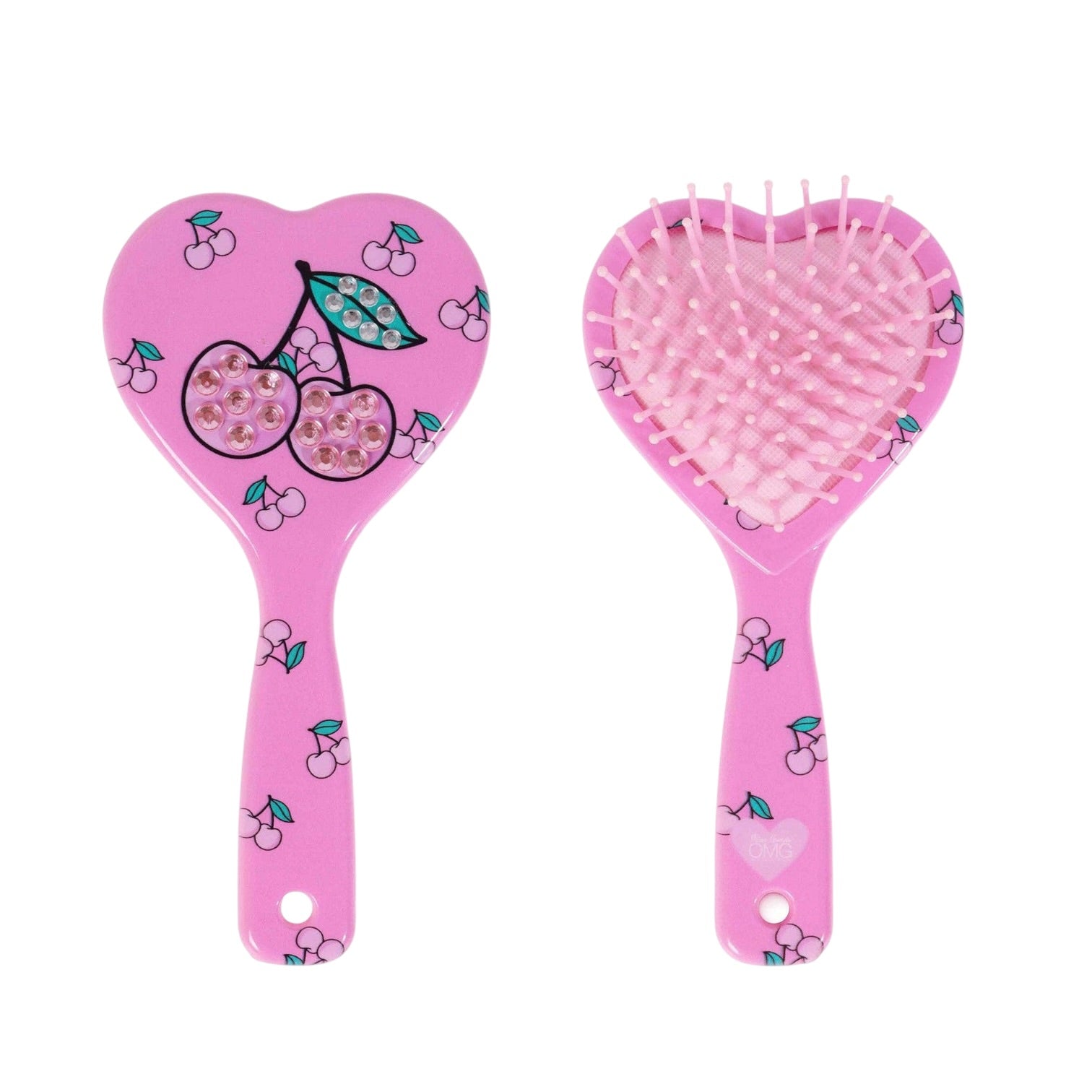 A pink heart-shaped hairbrush shown from both sides against a white background. One side features a decorative pink handle with a cherry illustration, and the other side shows the soft pink bristles.