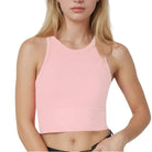 Person wearing a pink crop top on a white background