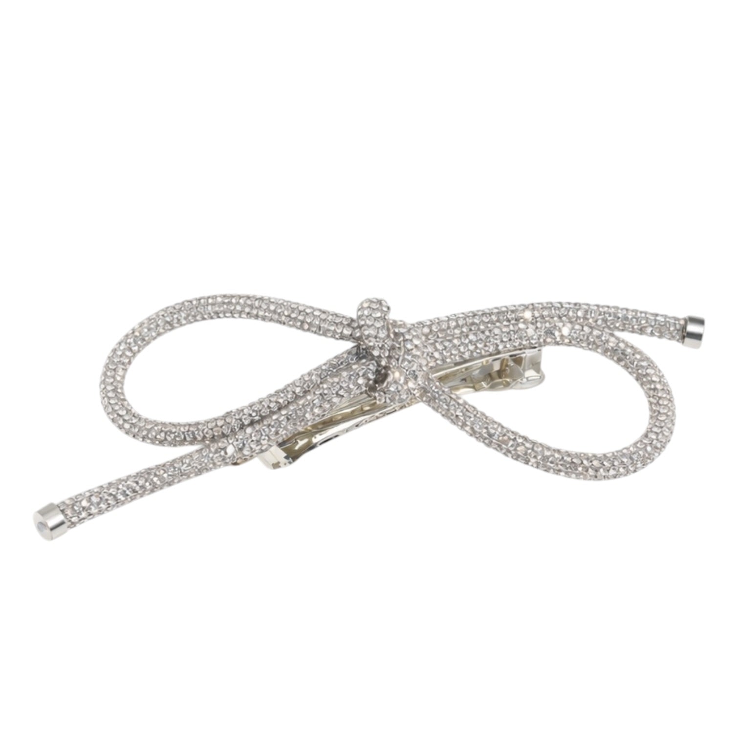 Silver bow-shaped hair clip with rhinestone detailing on a white background