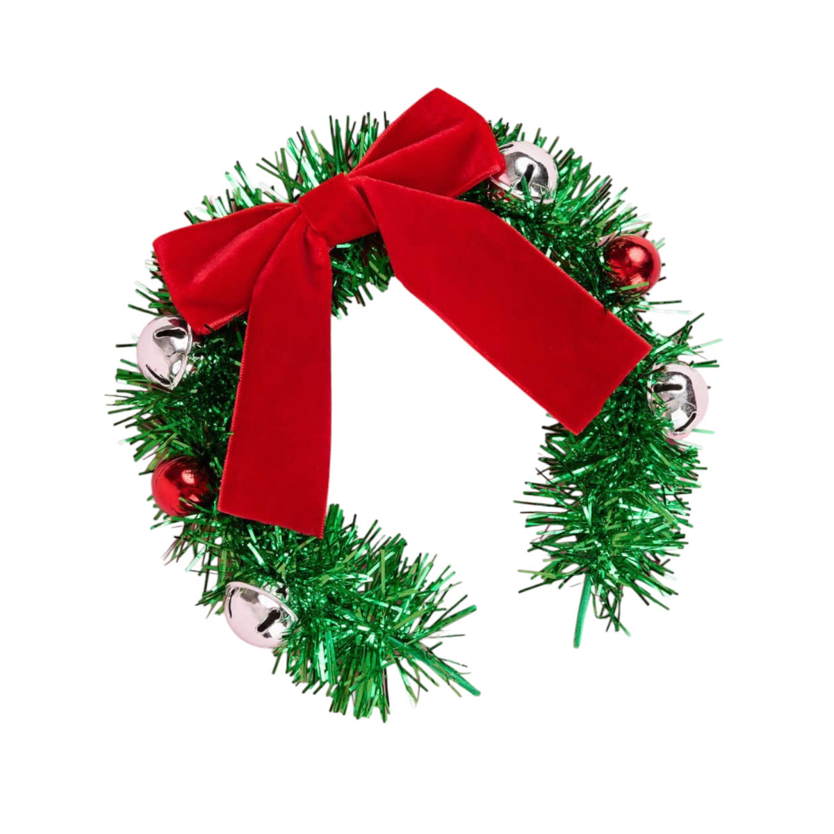A green tinsel Christmas wreath decorated with a large red velvet bow, red ornaments, and silver jingle bells, isolated on a white background.