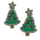 Two Christmas tree-shaped beaded patches with silver beaded borders, green beaded bodies, multicolored ornament accents, and star toppers on a white background.