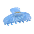 Blue hair clip with 'Ciao' text on a white background