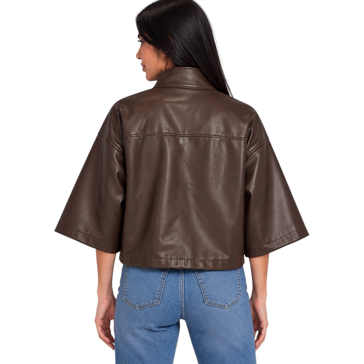 A woman shown from the back wearing a cropped brown faux-leather jacket with wide three-quarter sleeves and light blue jeans, against a plain white background.