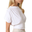 White top worn by a person on a white background