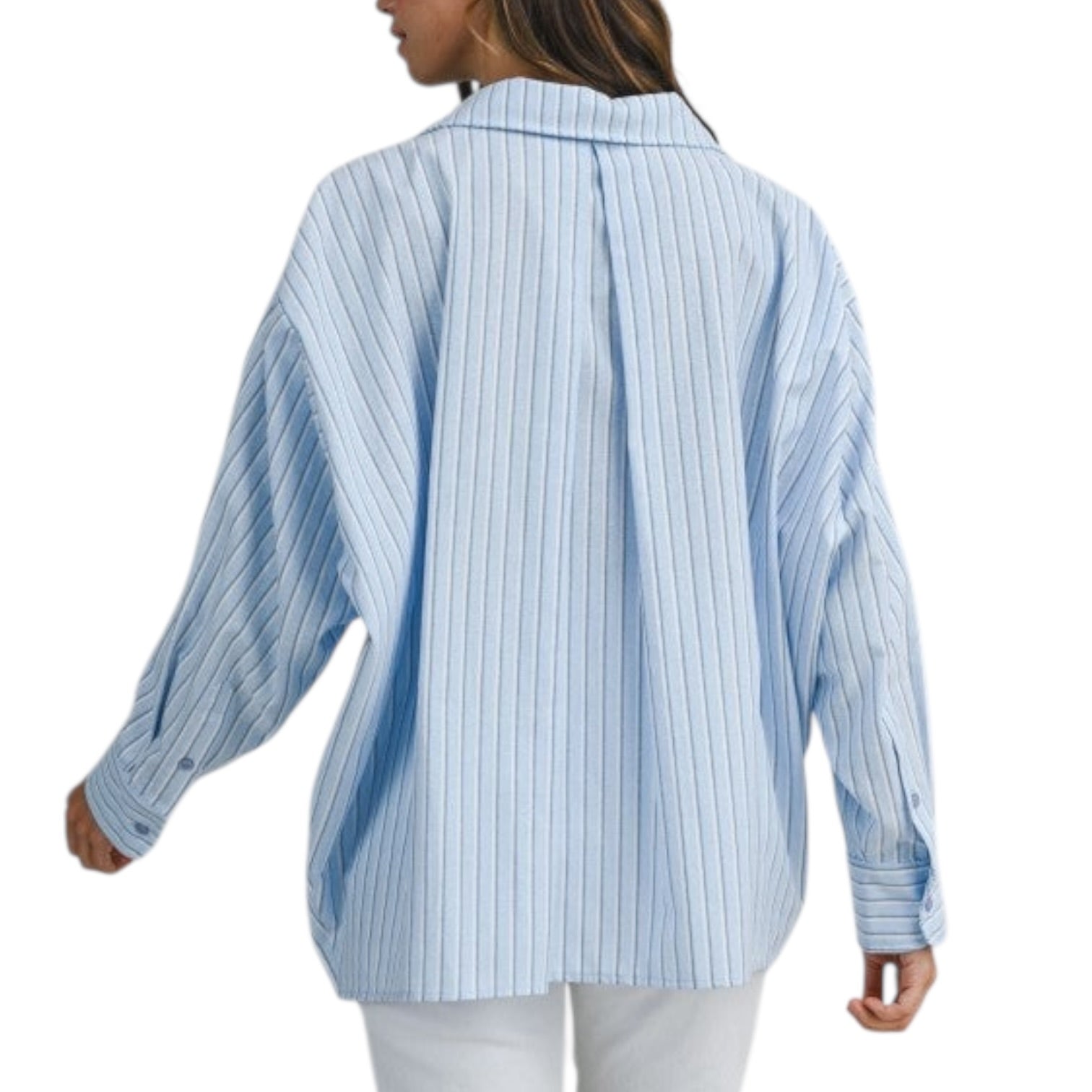 Person wearing a light blue and white striped shirt on a white background