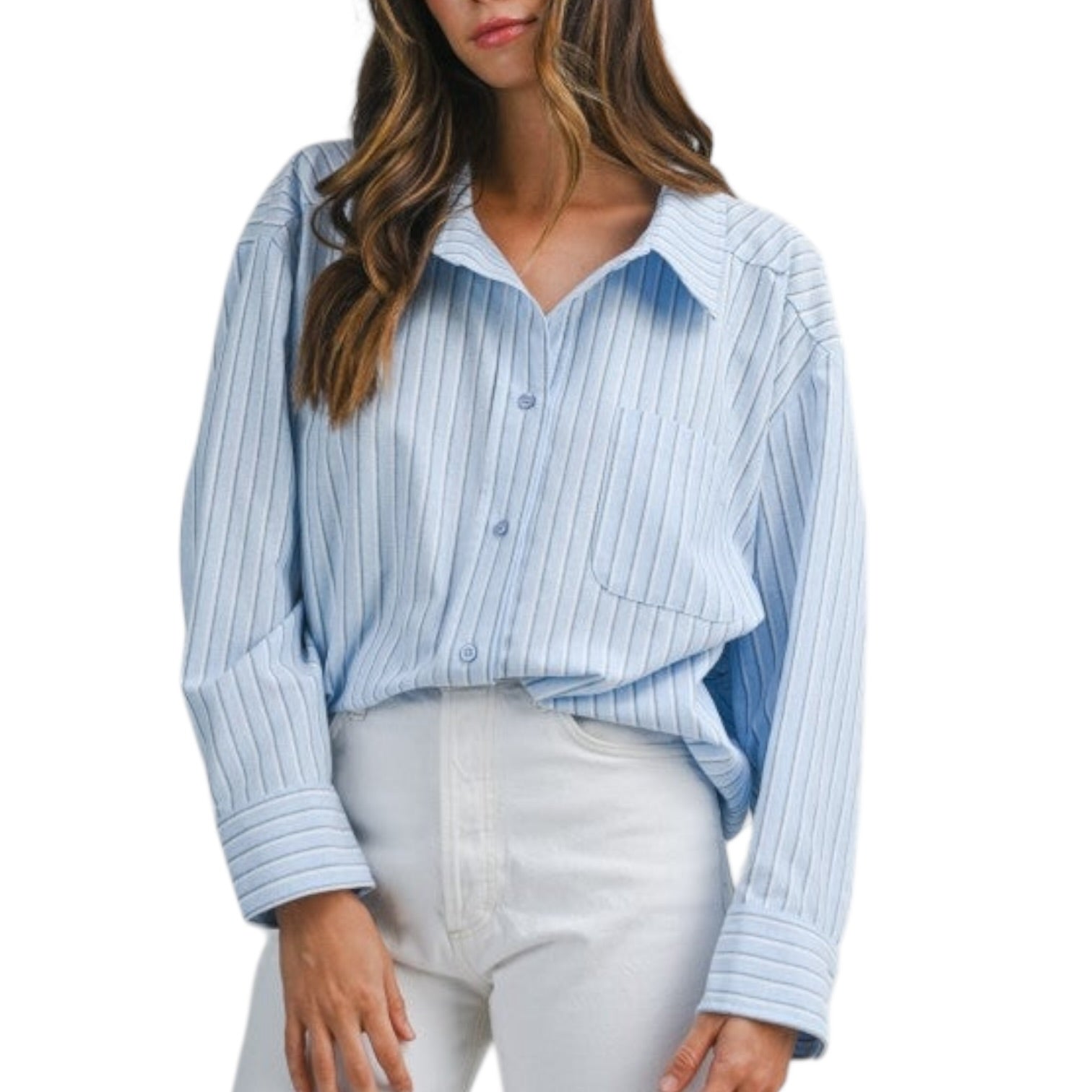 Woman wearing a light blue and white striped shirt with rolled-up sleeves on a white background