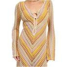 Colorful crochet dress with long sleeves on a white background