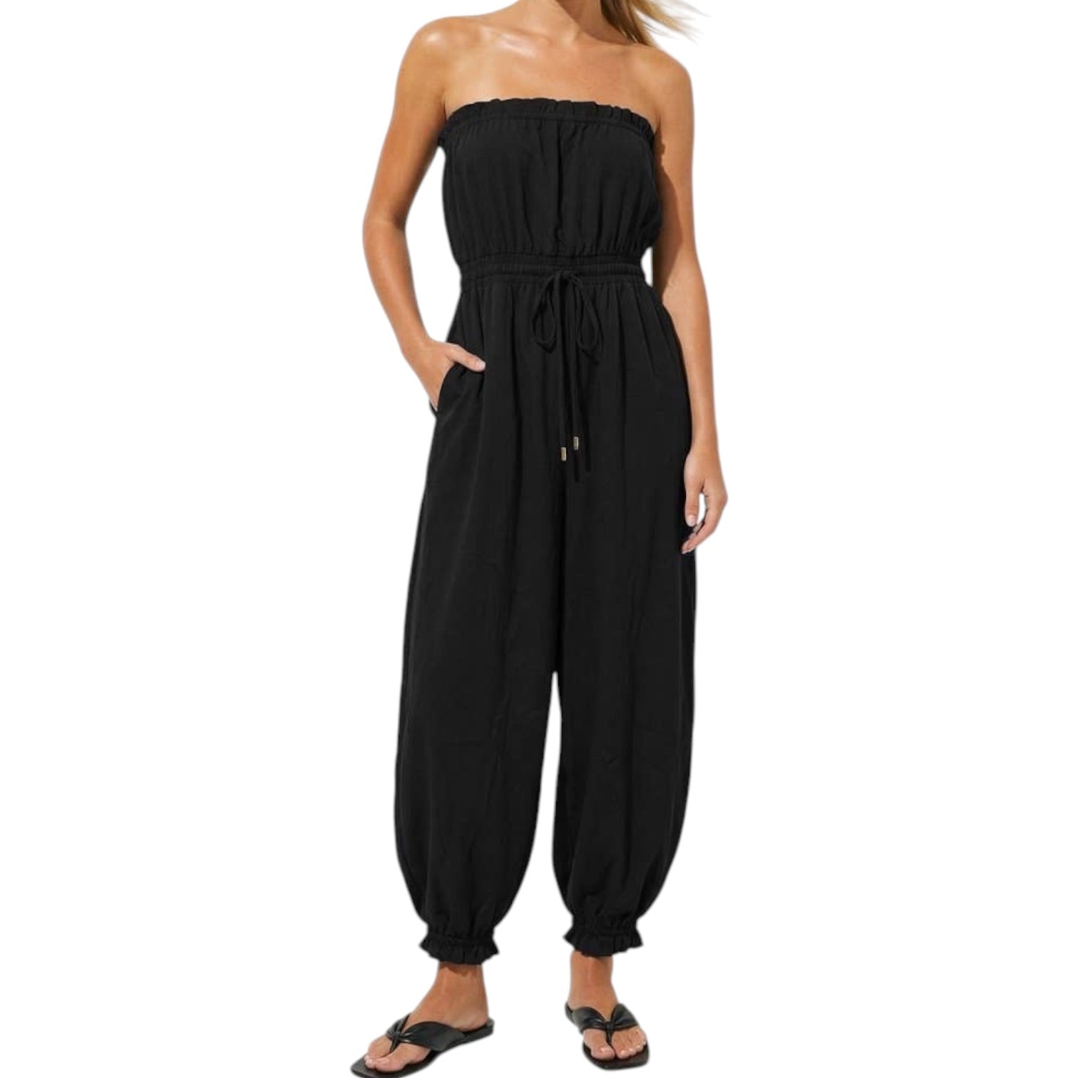 Black strapless jumpsuit worn by a model on a white background