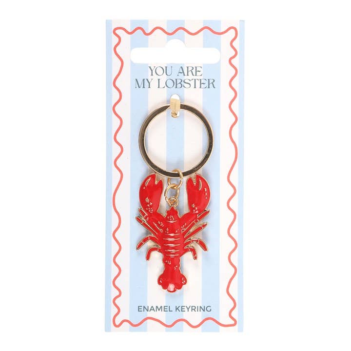 Red lobster keychain on a blue card with text