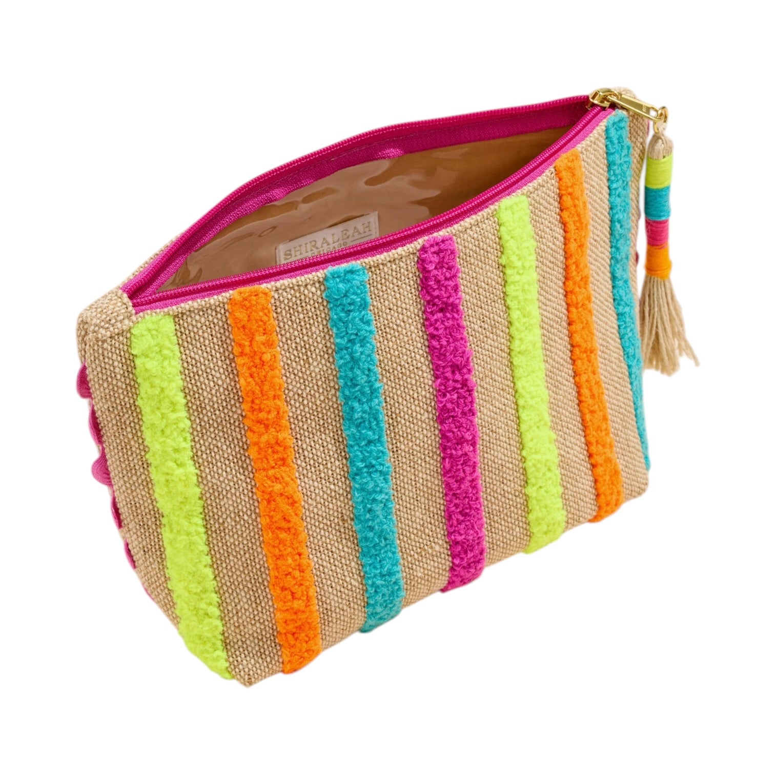 Colorful striped pouch with a tassel on a white background
